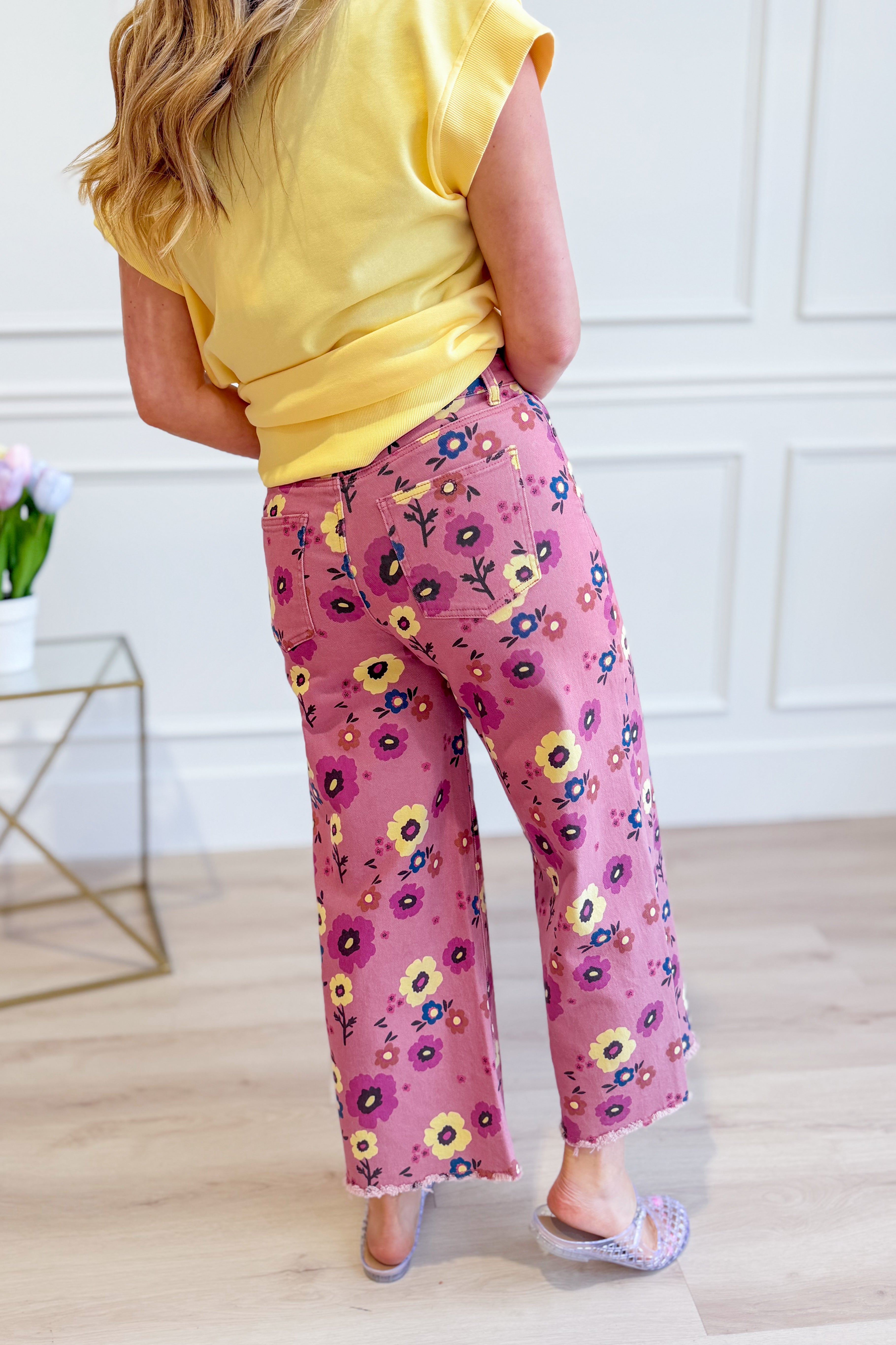 EASEL Eleanor Floral Wide Leg Pant featuring a vibrant floral pattern and flowy wide leg design.
