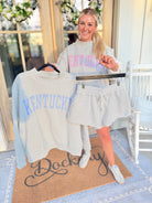 Kentucky Blue striped mock embroidered sweatshirt from BUCKET LIST 137 Graphic Sweatshirts collection, featuring blue and white stripes.