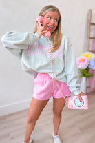 Kentucky pink striped mock embroidered sweatshirt from BUCKET LIST 137 graphic sweatshirts collection, showing front view with embroidered details.