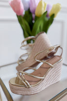 Berness Rhea Gold Wedge Sandal with ankle strap, featuring a cork wedge heel and stylish design for summer wear.