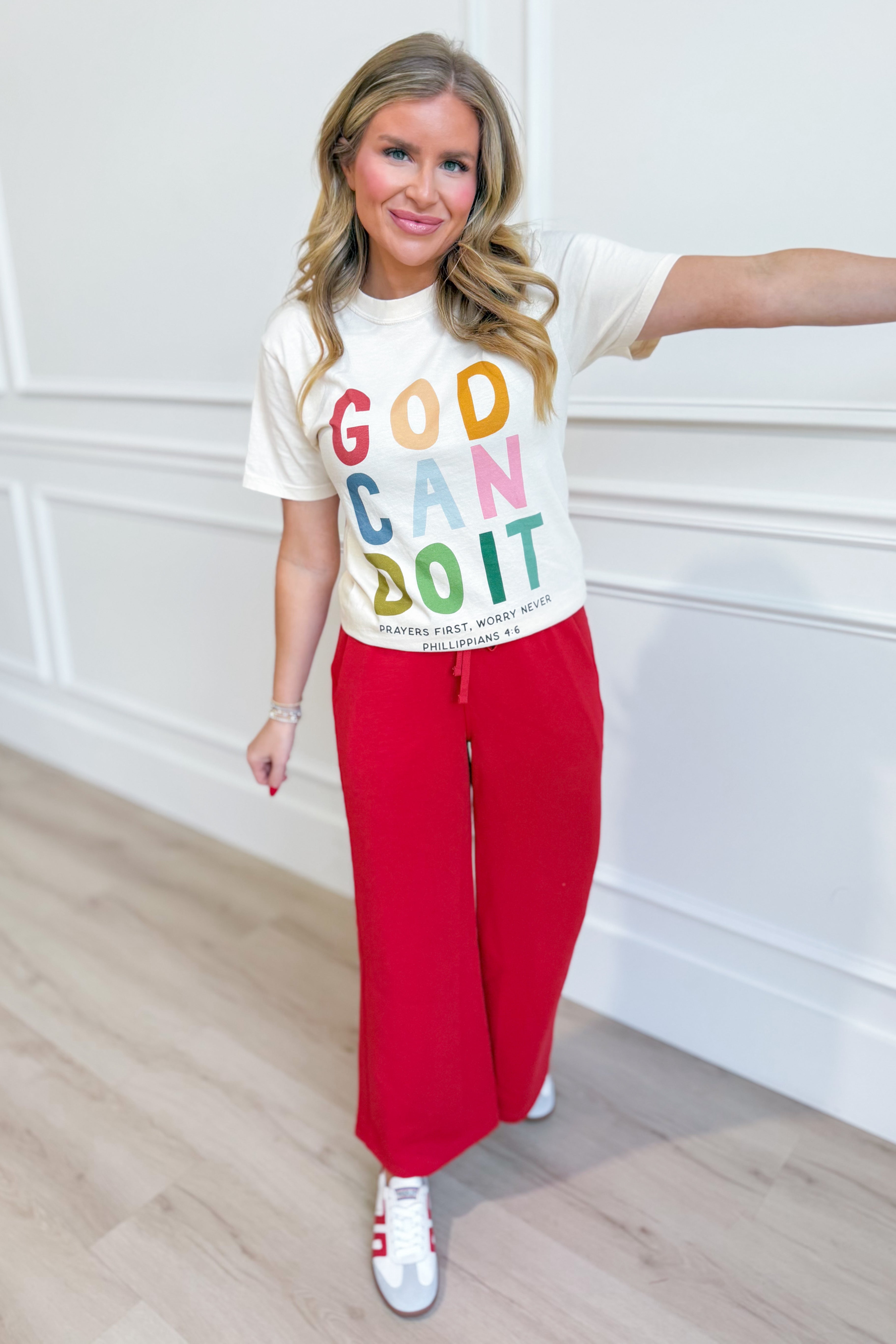Poppy & Pine God Can Do It graphic T-shirt, black short sleeve tee with bold white text and design for casual wear.