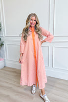 TCEC Aly striped button-down midi dress with long sleeves and fitted waist, featuring a stylish midi length and classic stripe pattern.