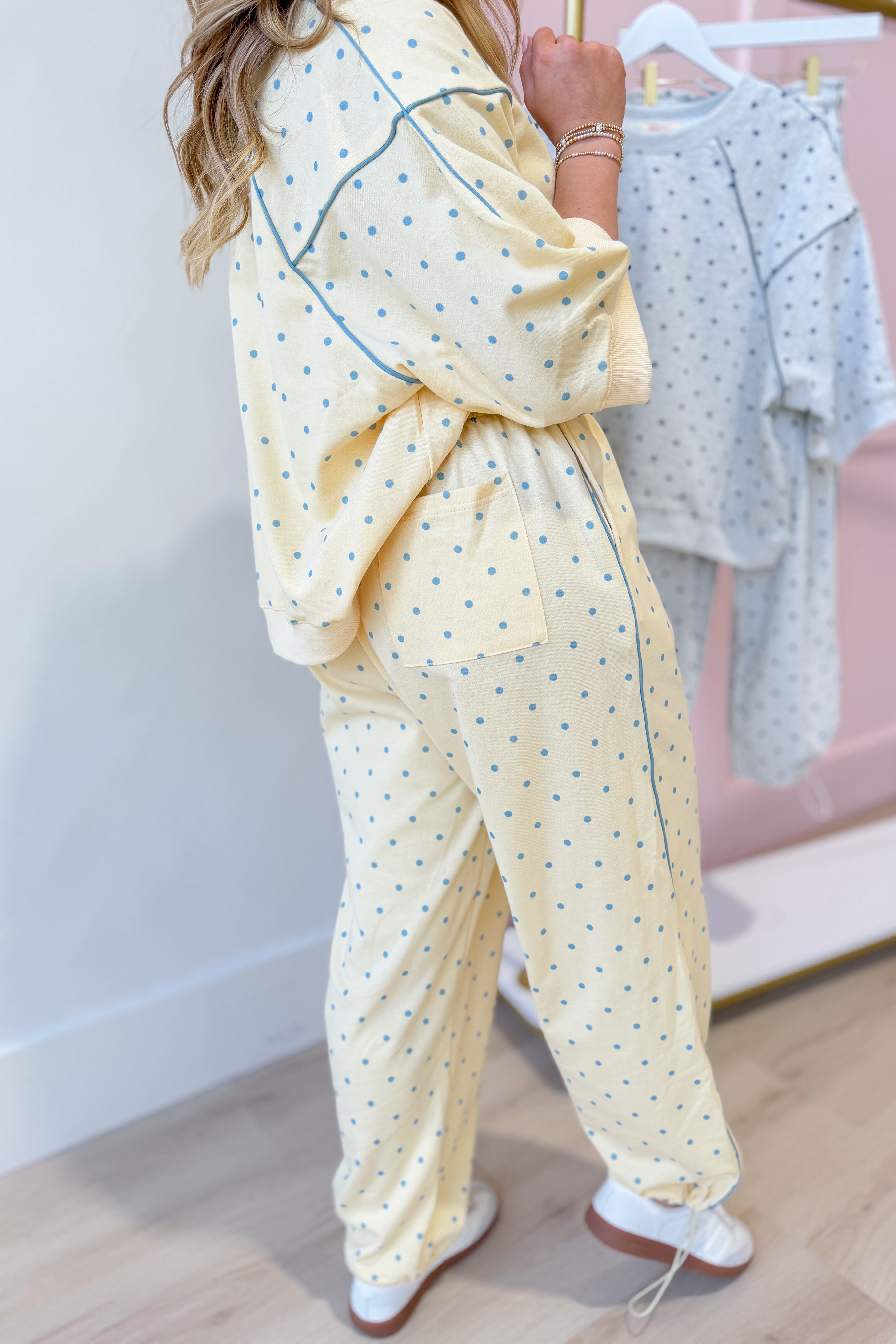 Frederick Butter Yellow Polka Dot French Terry Track Pants by PEACH LOVE, showing the yellow polka dot pattern and relaxed fit.