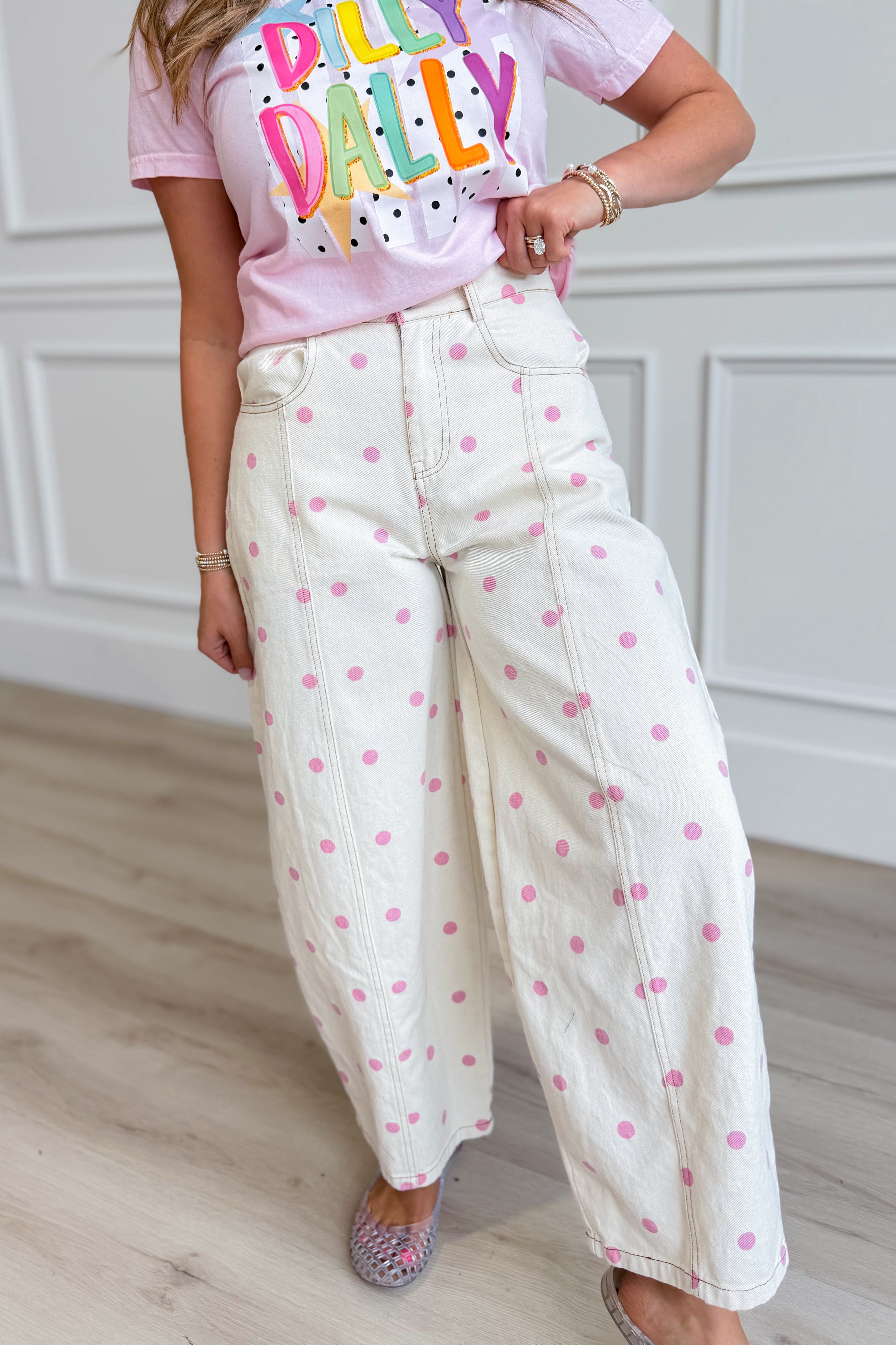 Pink polka dot barrel jeans by PEACH LOVE, 147 novelty jeans style, with a relaxed fit and vintage-inspired design.