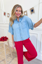 HYFVE Laurie button-up patch pocket shirt in denim, featuring long sleeves and a relaxed fit, styled on a model.