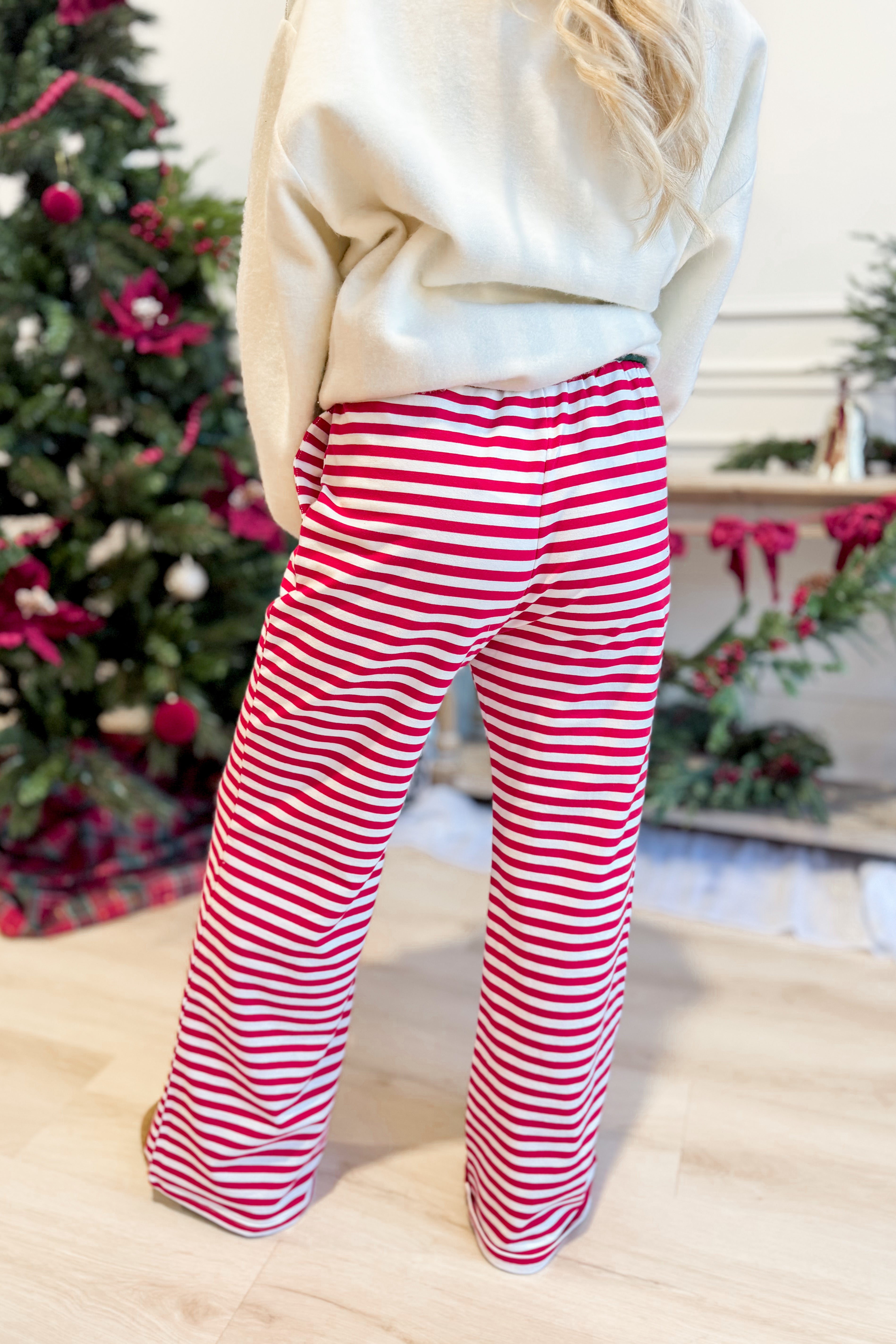 Rudy Red Striped Holiday Pants from BUCKET LIST, 156 Pants style, featuring festive red and white stripes, casual holiday wear