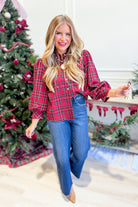 Jodifl Lucas plaid holiday top with long sleeves, featuring a stylish pattern and relaxed fit, perfect for festive occasions.
