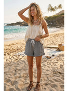 SEWN AND SEEN Cory checkered ruffle hem shorts, 152 shorts, stylish summer casual wear, front view with ruffle detail