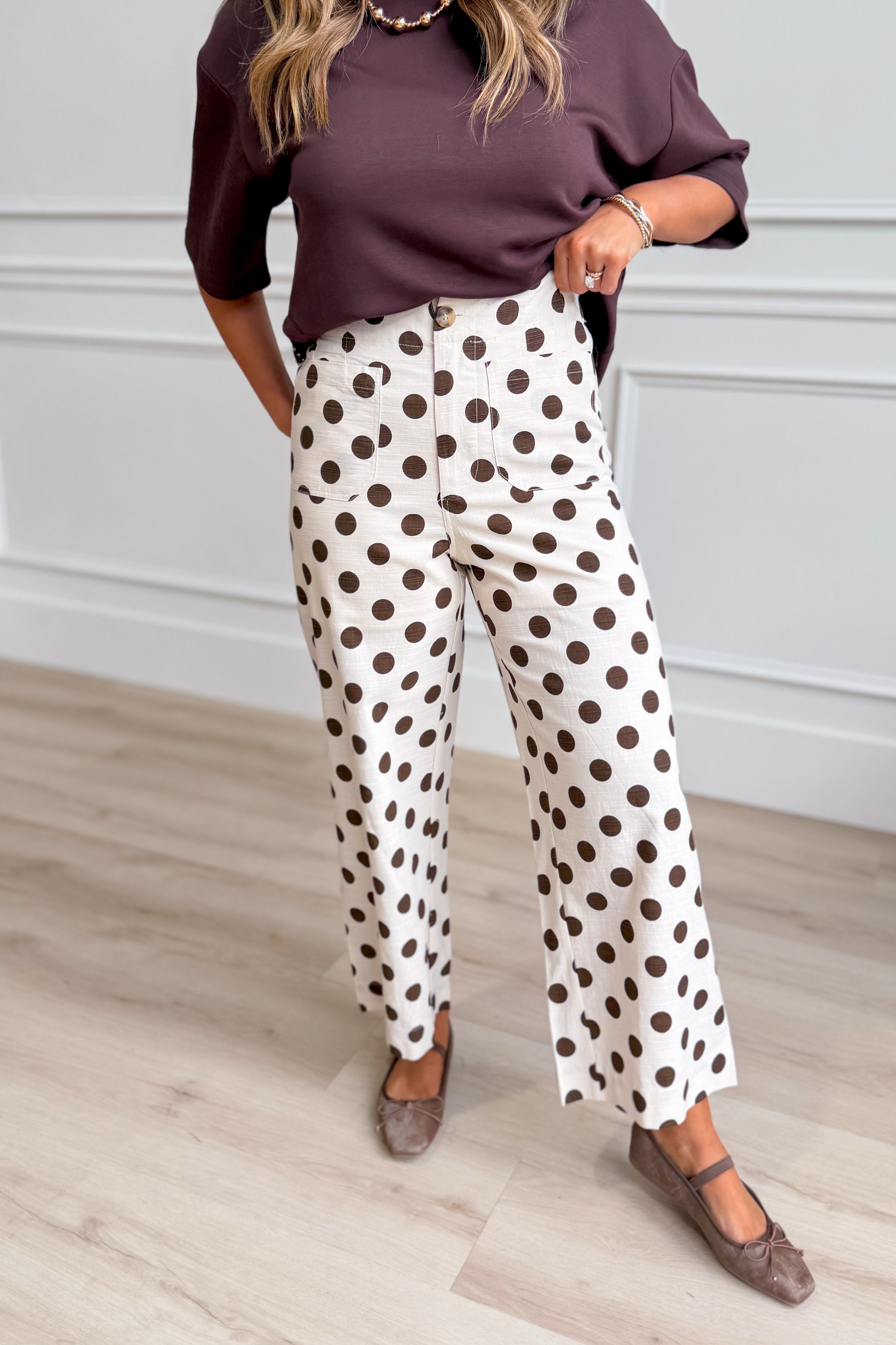 Kelly Brown polka dot wide-leg jeans from JODIFL featuring a relaxed fit and playful polka dot pattern.