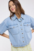 WISHLIST Oscar collared denim button-up top, casual 105 top, shown in classic blue denim with front button closure and collar.