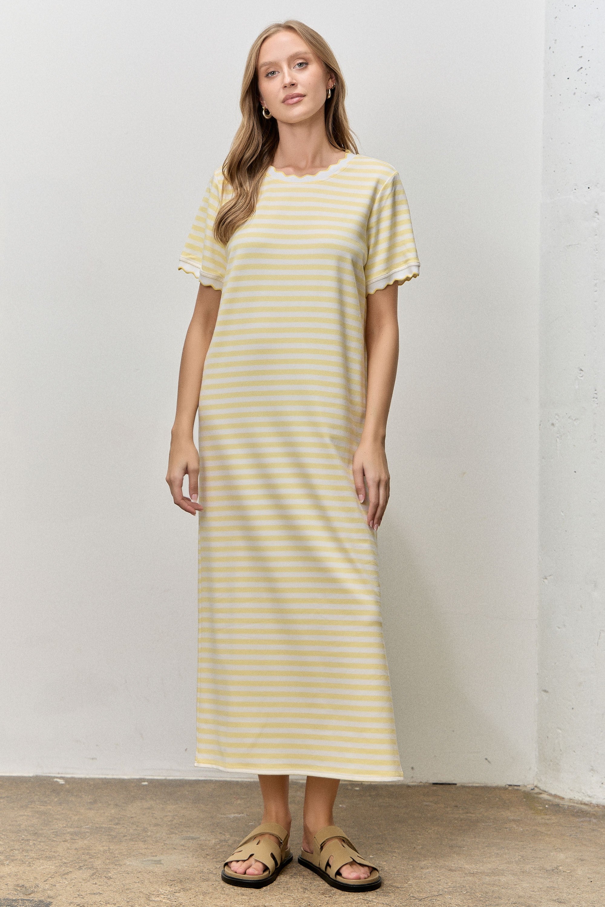 Baevely Piper Butter striped short sleeve midi dress with casual fit, featuring a relaxed style and colorful pattern.