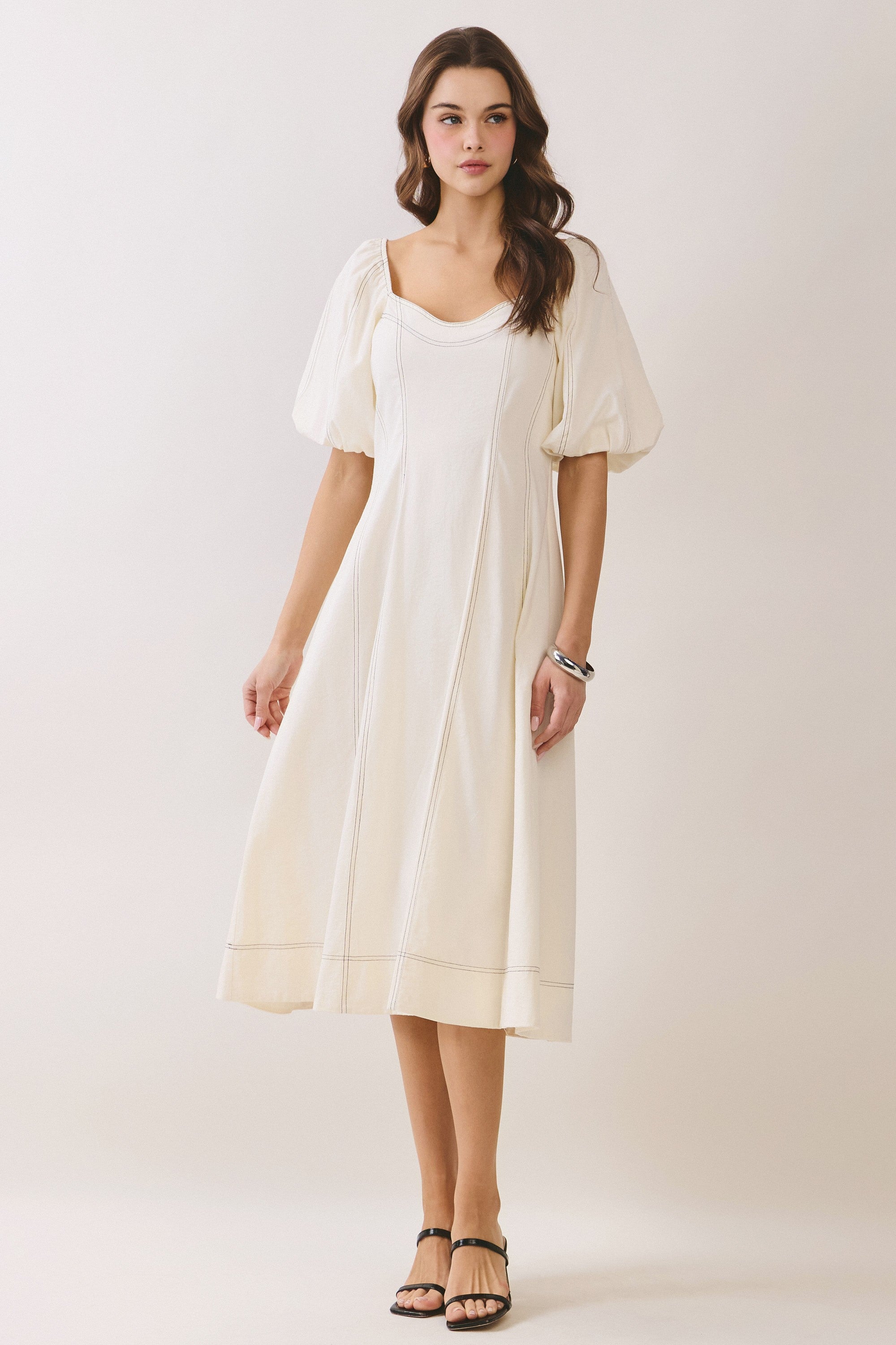 TCEC Katelyn puff sleeve smocked back dress in a flowy, elegant design, perfect for dressy occasions.