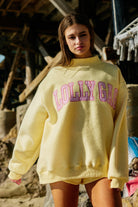 Reversible mock neck sweatshirt from BUCKET LIST's 137 Graphic Sweatshirts collection, featuring bold graphic design on the front and back.