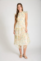 BLU PEPPER Serena Butter Floral Tulle Smocked Dress, a stylish 125 dressy dress with floral and tulle details, shown on a model.