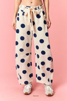 Logan Polka Dot Barrel Jeans by PEACH LOVE, 147 Novelty Jeans featuring a polka dot pattern and barrel-leg style.