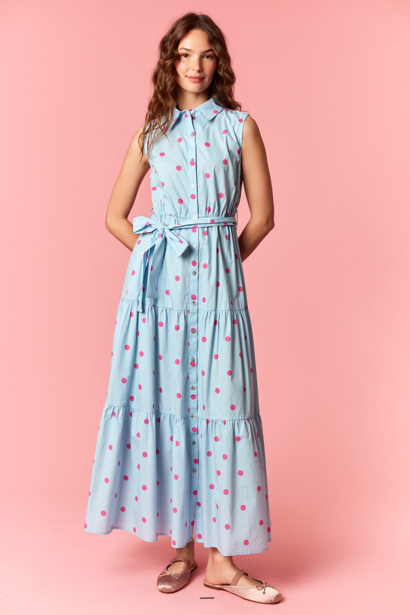 PEACH LOVE Taylor polka dot midi dress featuring a flowy silhouette and stylish pattern, perfect for dressy occasions.