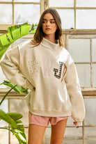 Black BUCKET LIST WWJD mock embroidered sweatshirt with graphic design, featuring embroidered "What Would Jesus Do?" text on front.