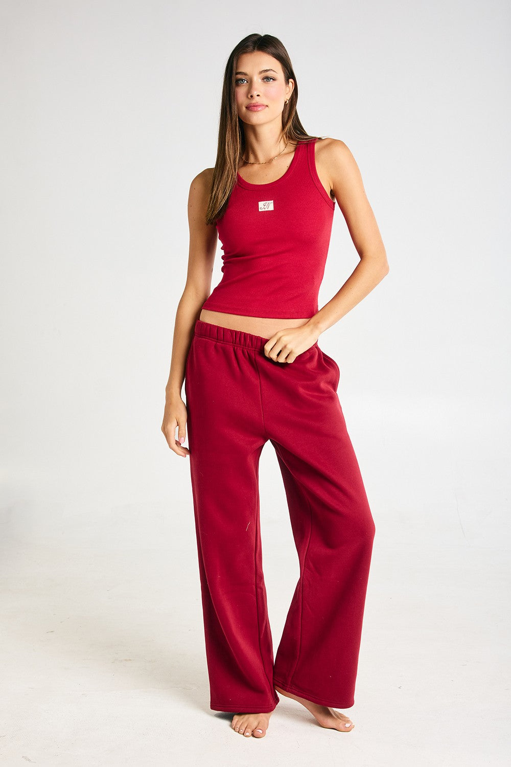 Conrad Dark Cherry Sweat Pant from BUCKET LIST, 156 pants style, featuring a relaxed fit and dark cherry color.
