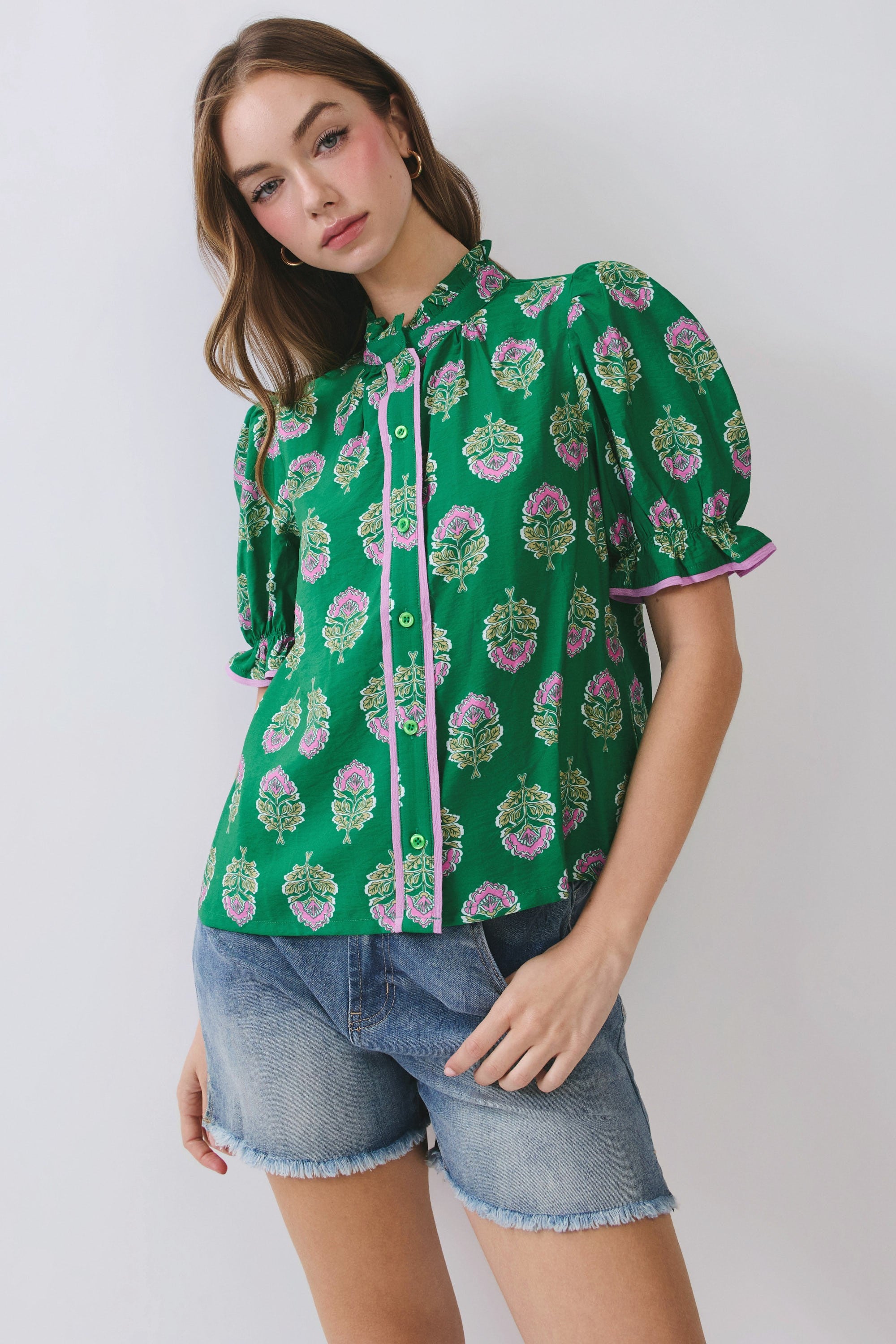 TCEC Taylor floral color block top featuring vibrant floral patterns and a stylish, dressy design.