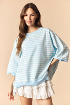 Nolan Lt Blue Striped Lettuce Trim Top from PEACH LOVE, casual 105 top with lettuce-edged sleeves and neckline, lightweight and stylish.