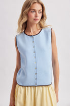 Wishlist Caitlin sleeveless top with contrasting trim, casual style, shown in a close-up of the top's fabric and design details.