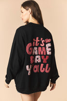 Black Cynthia Game Day Pullover by PEACH LOVE featuring graphic design, casual fit, and comfortable sweatshirt fabric.