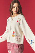 Peach Love Micah embroidered holiday rolled edge cardigan, fall sweater with festive embroidery and cozy knit fabric, front view.