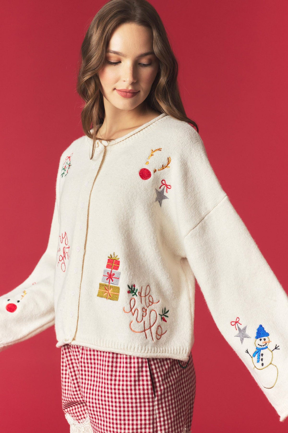 Peach Love Micah embroidered holiday rolled edge cardigan, fall sweater with festive embroidery and cozy knit fabric, front view.