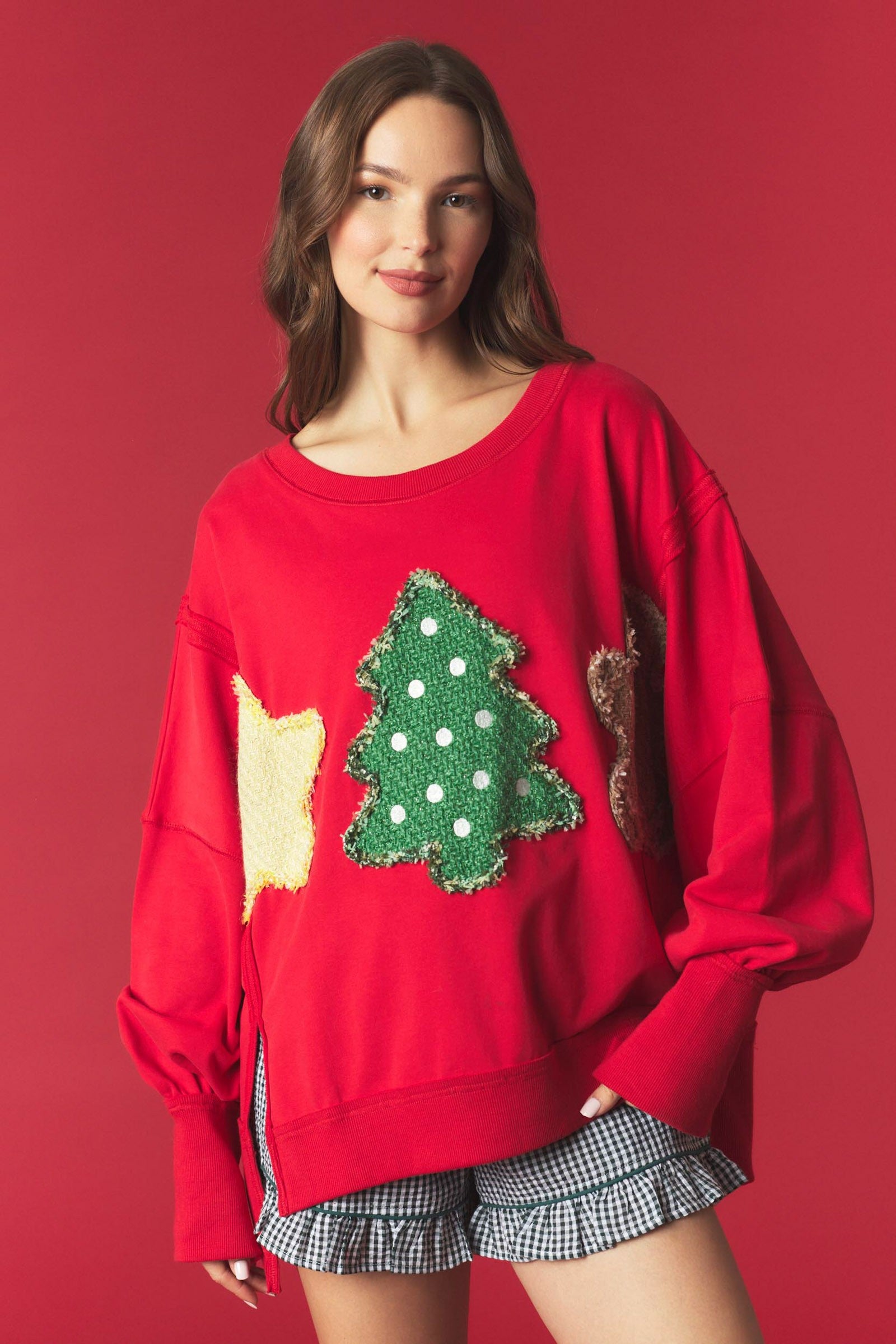PEACH LOVE Tweed Christmas Patch Pullover Sweatshirt featuring festive patch designs and a cozy, textured knit fabric.