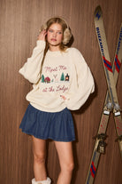 LE LIS Brynn Meet Me At The Lodge fall sweater, cozy knit with a relaxed fit, in warm earthy tones, perfect for autumn.