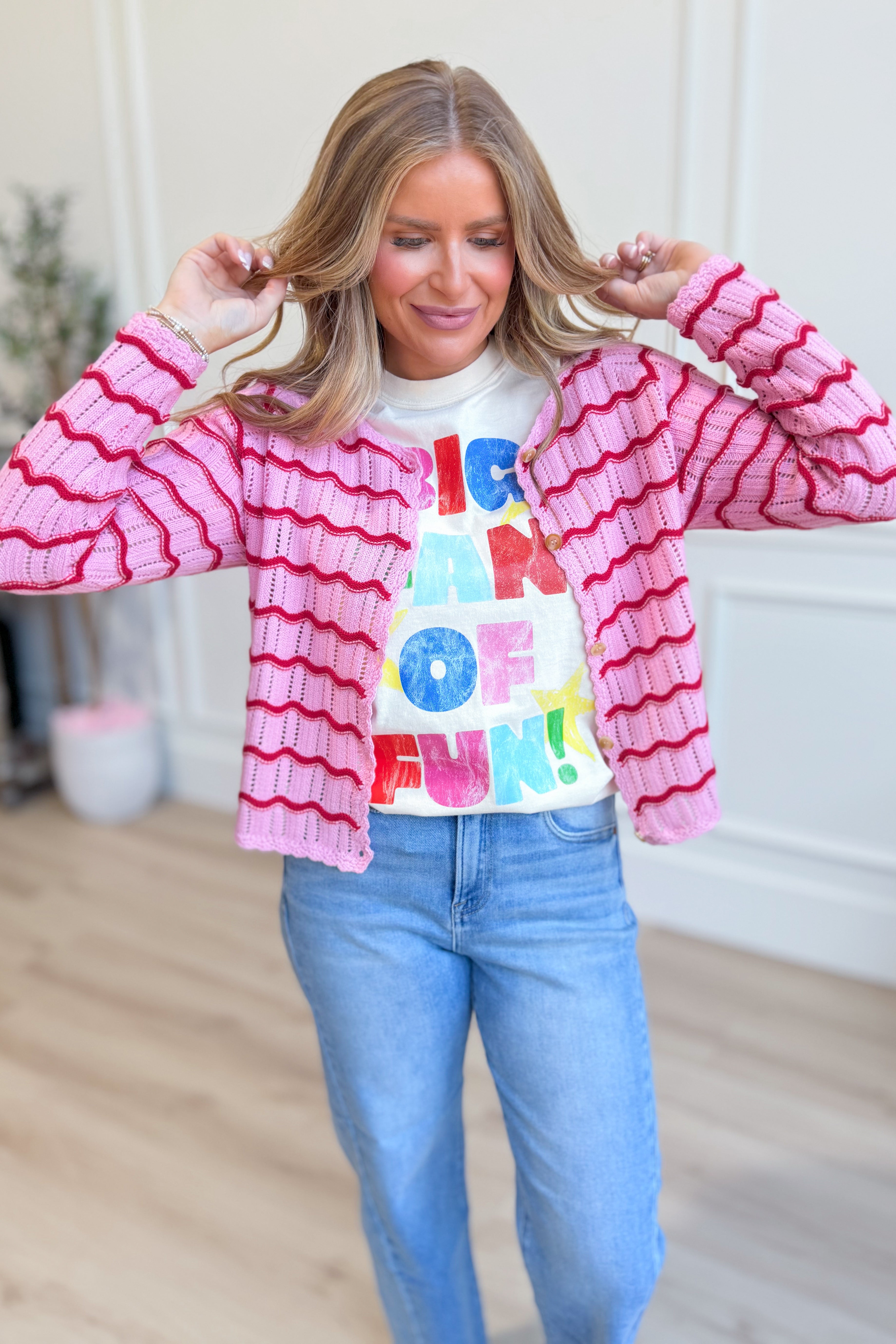Pink crochet knit Sarah cardigan from BAEVELY, featuring a lightweight spring sweater with intricate crochet details.
