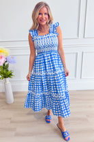 Baevely Lindsey Gingham Flutter Sleeve Dress showing a stylish dress with flutter sleeves and a classic gingham pattern.