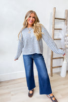 TWENTIFOURTH Chelsea multi-striped fall sweater featuring a cozy knit design with colorful horizontal stripes.