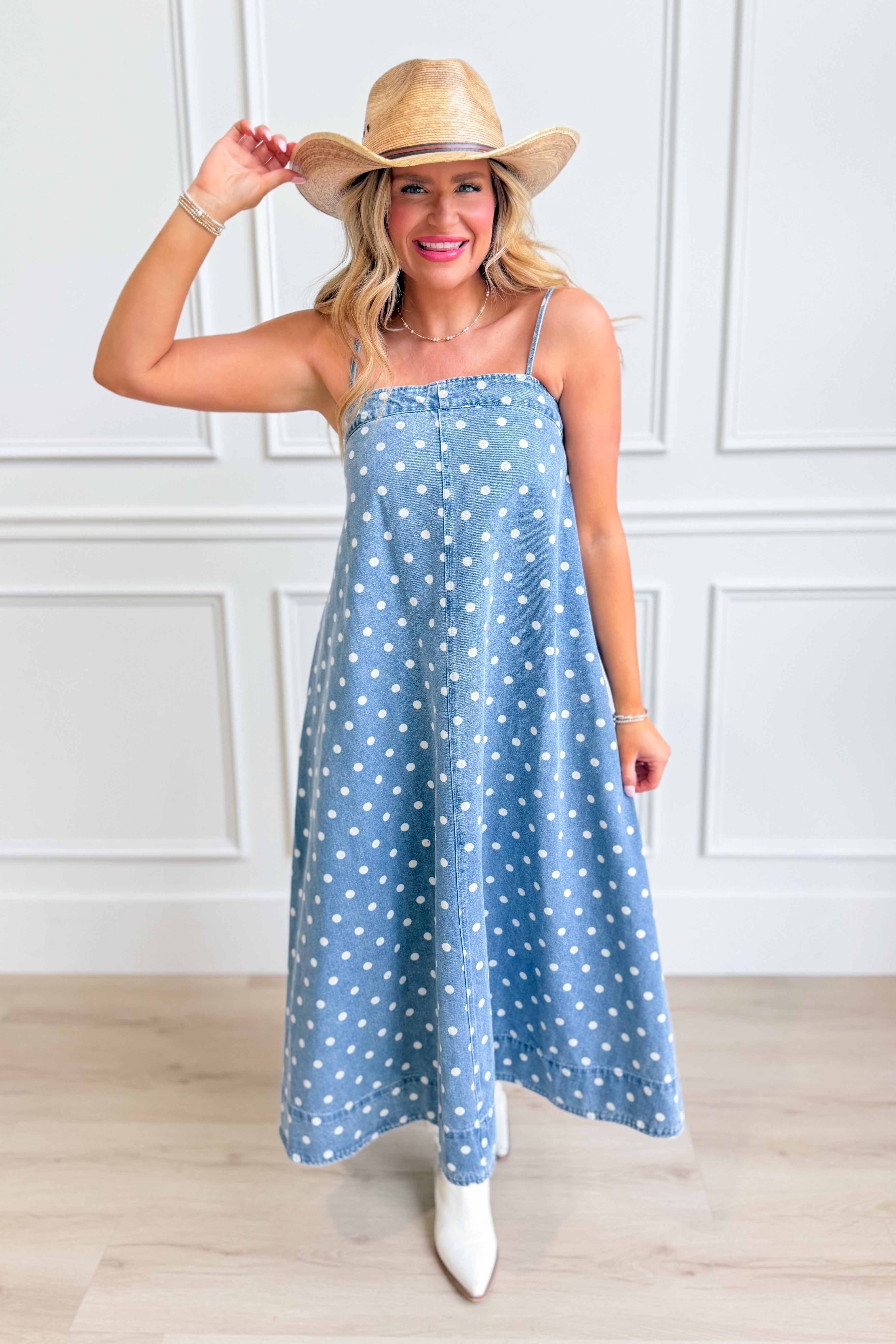 Aureum Mia polka dot denim dress with a fitted silhouette, short sleeves, and a classic round neckline, perfect for casual wear.
