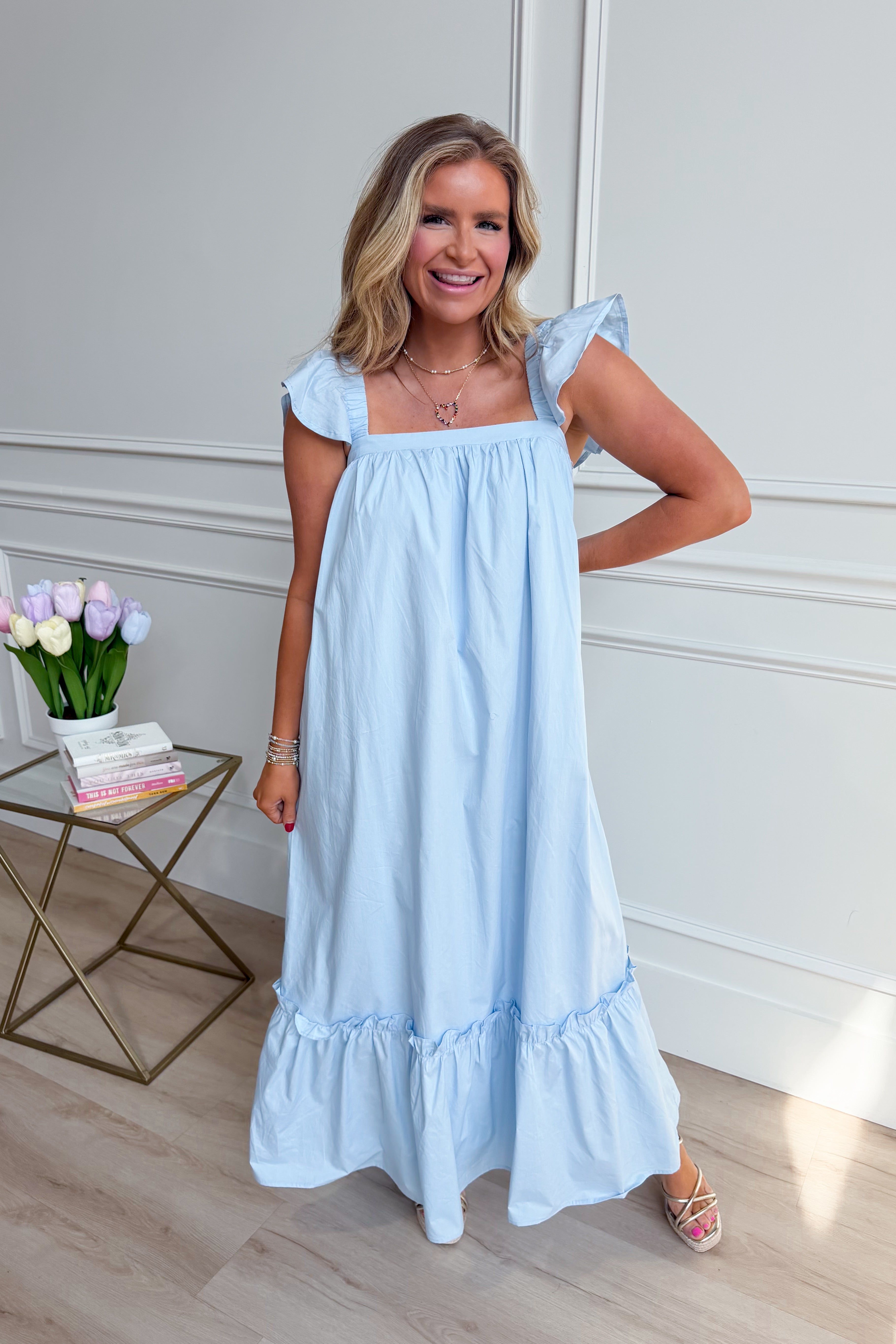 Folly Baby Blue Flutter Sleeve Midi Dress by TCEC featuring a relaxed fit and soft fabric, perfect for casual summer wear.