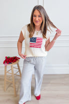 George USA flag sweater top from EE:SOME, featuring a spring sweater design with a patriotic USA flag pattern.