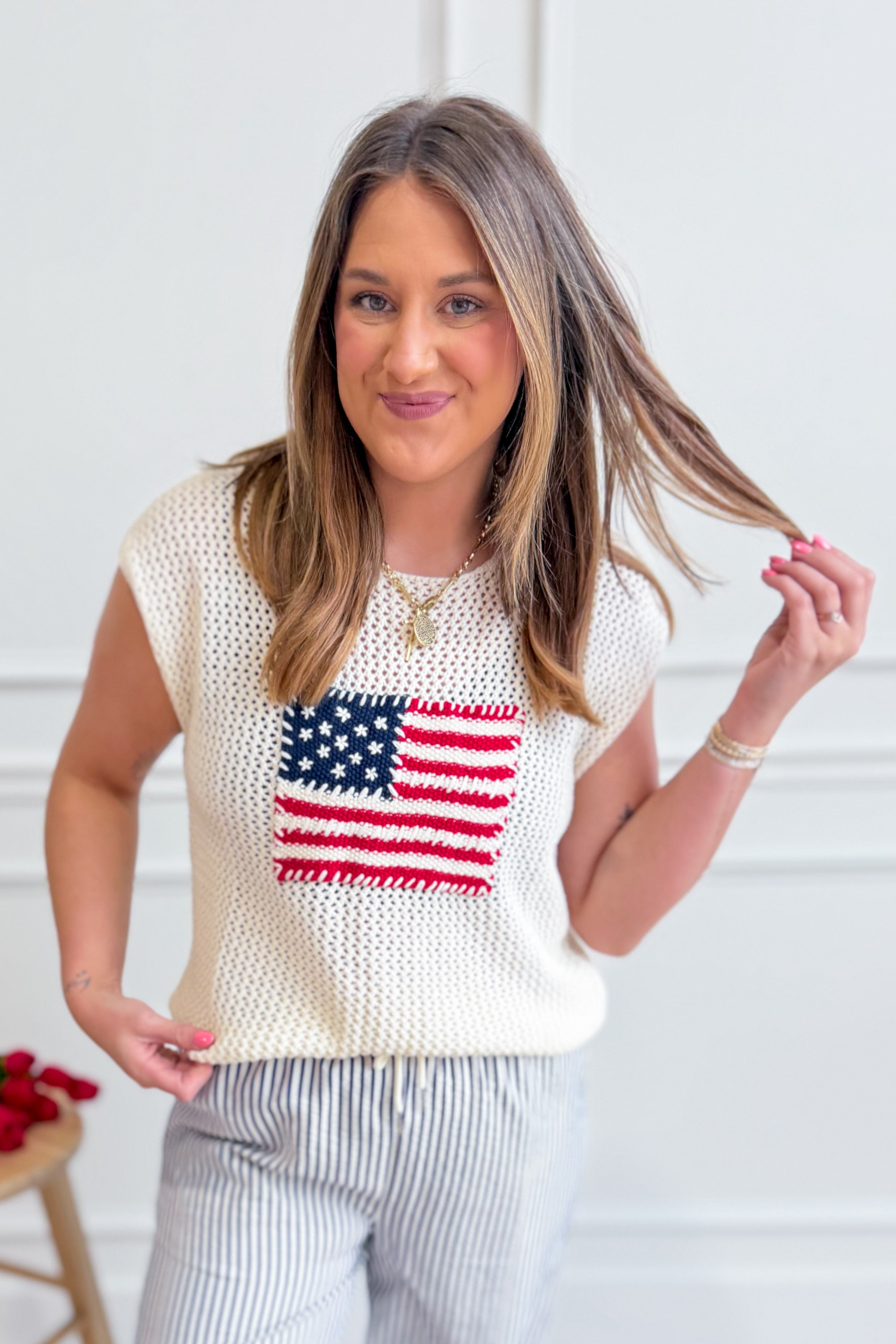 EE:SOME George USA flag sweater top from 131 Spring Sweaters collection, featuring patriotic design and cozy knit fabric.