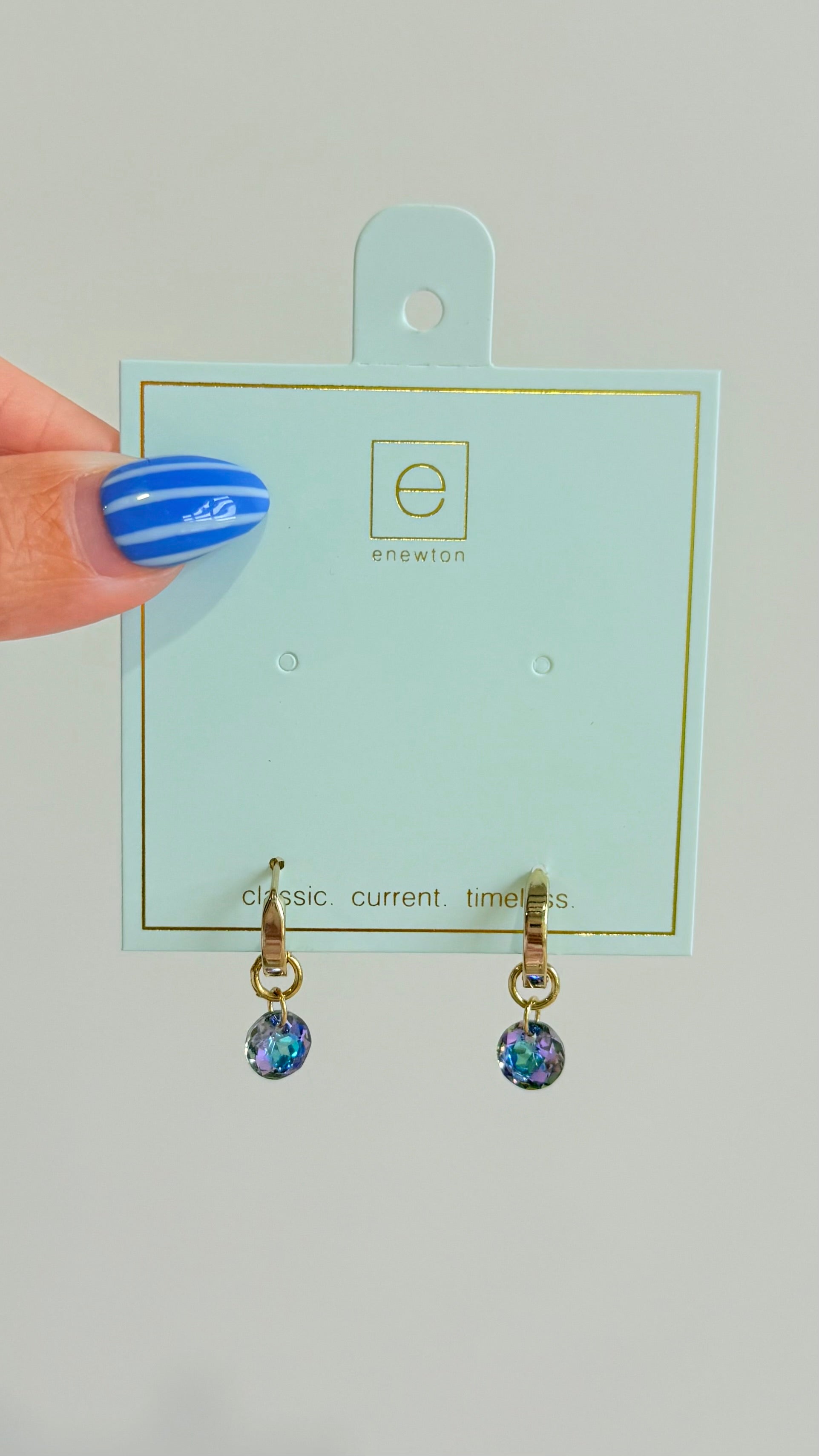 Enewton .5mm Classic Birthstone Huggie earrings with small gemstones in silver or gold setting, stylish and elegant jewelry.