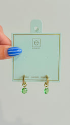 Enewton .5mm Classic Birthstone Huggie earrings in silver with small colorful birthstone accents, designed for pierced ears.