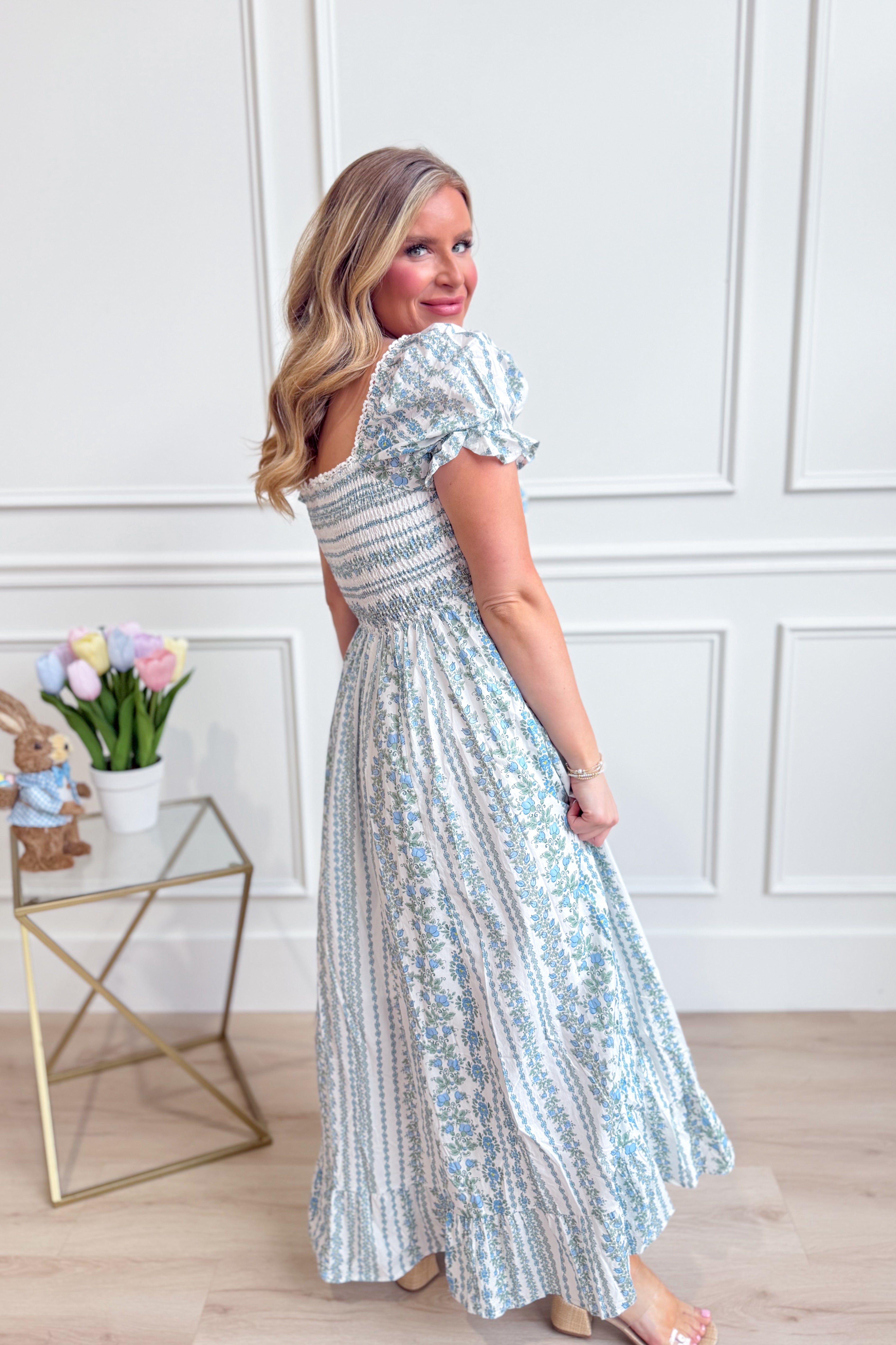 IN LOOM French floral cotton maxi dress with a flowing silhouette and vibrant floral pattern, perfect for elegant occasions.