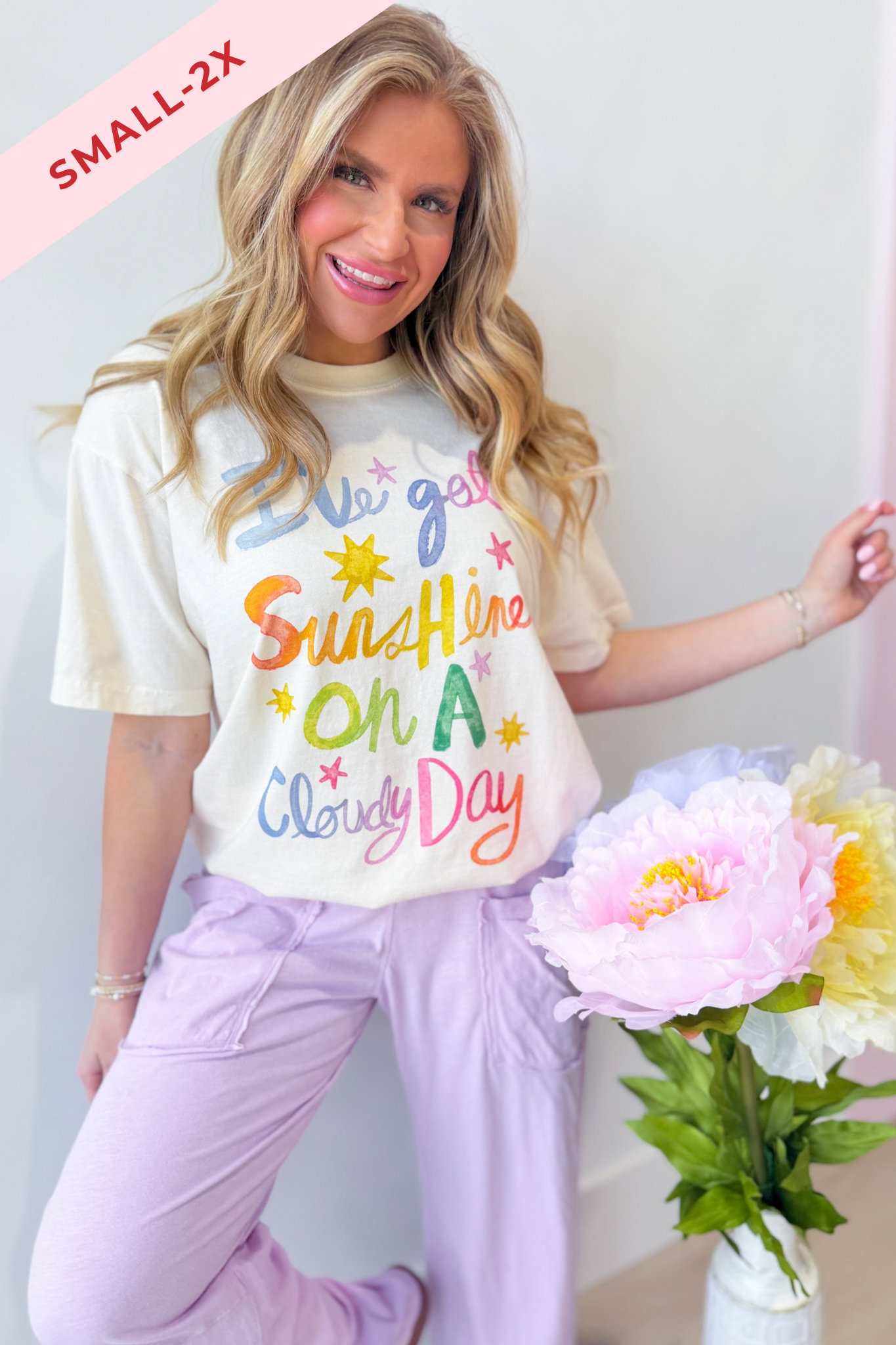 Poppy & Pine Ive Got Sunshine graphic T-shirt featuring bright yellow sun and cloud design on soft cotton fabric.