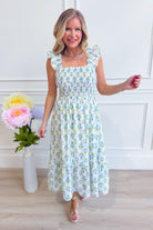 BLU PEPPER Tabatha floral tulle midi dress with a delicate pattern, perfect for dressy occasions, shown on a model.