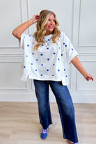 PEACH LOVE Renee polka dot dolman sleeve casual top, lightweight fabric with a relaxed fit and stylish polka dot pattern.