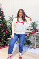 Wishlist Lottie Merry cursive holiday sweater with festive lettering and cozy knit fabric