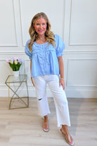 Holly light blue puff sleeve frilly top by ENTRO, stylish dressy top with ruffled sleeves and feminine design.