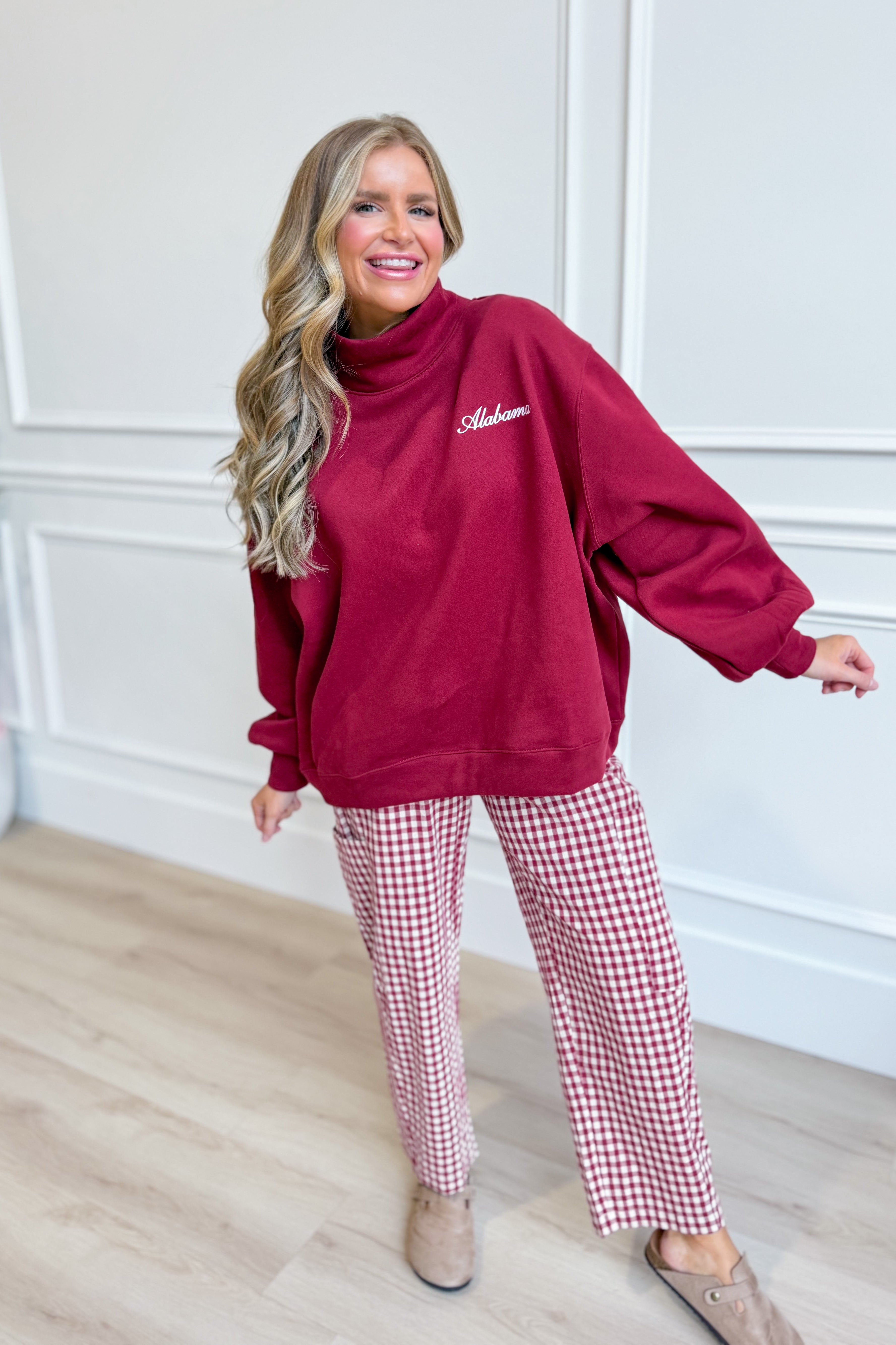 Burnt crimson mock neck sweatshirt from BUCKET LIST's 137 Graphic Sweatshirts collection, featuring a cozy fit and stylish design.