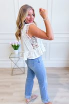 EE:SOME Tracey side lace trim ruffle top, casual 105 top with delicate lace accents and ruffle details, displayed on a hanger.