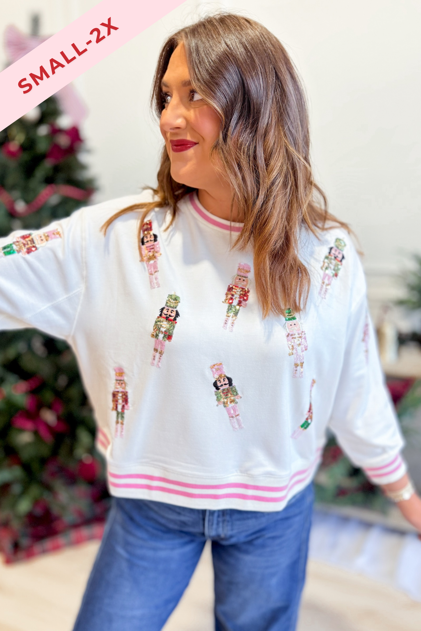 Mary Square Millie Nutcracker sequin pullover sweatshirt with festive nutcracker graphic and sparkling details