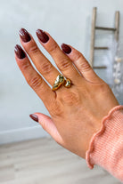 Close-up of Caroline Hill Novara Adjustable Ring with intricate silver design, showcasing its adjustable band and detailed craftsmanship.