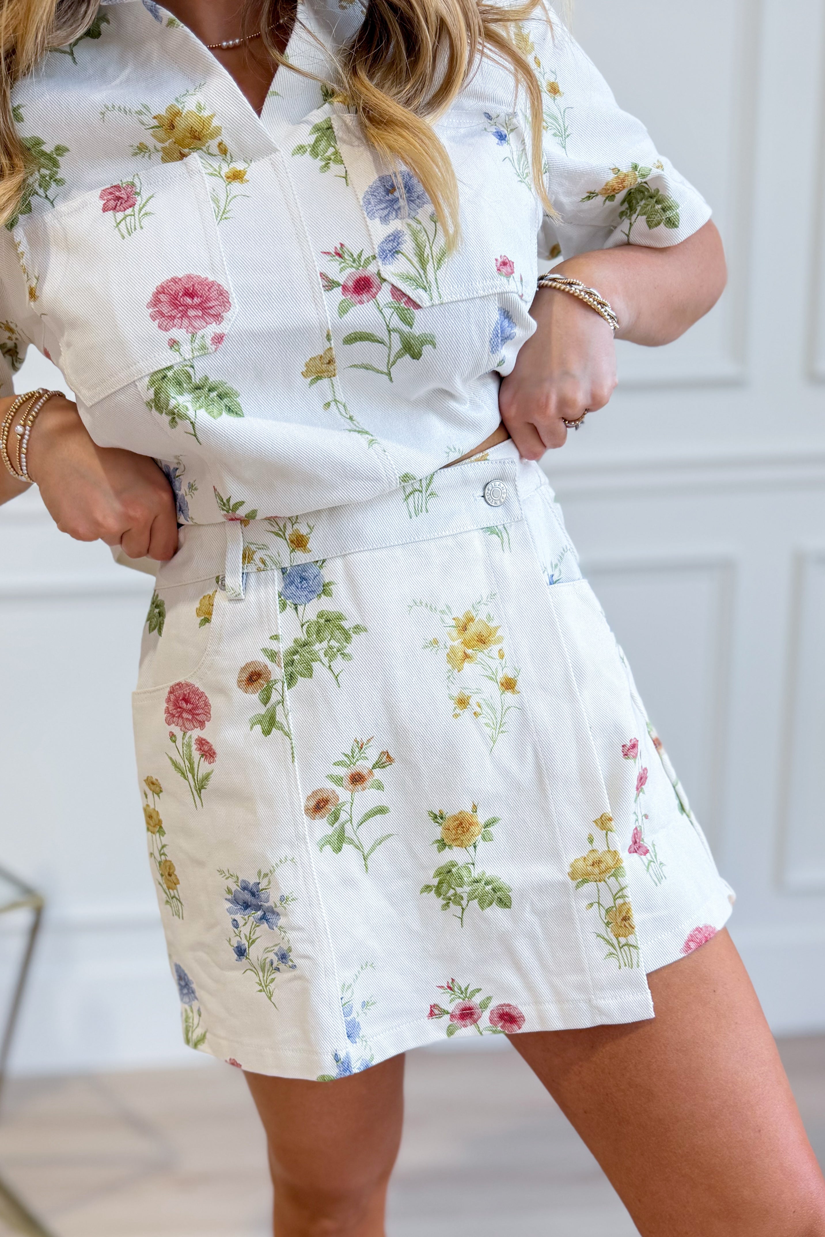 ENTRO Sadie floral printed wrap skirt with vibrant floral pattern and flowing fabric, perfect for casual or dressy outfits.